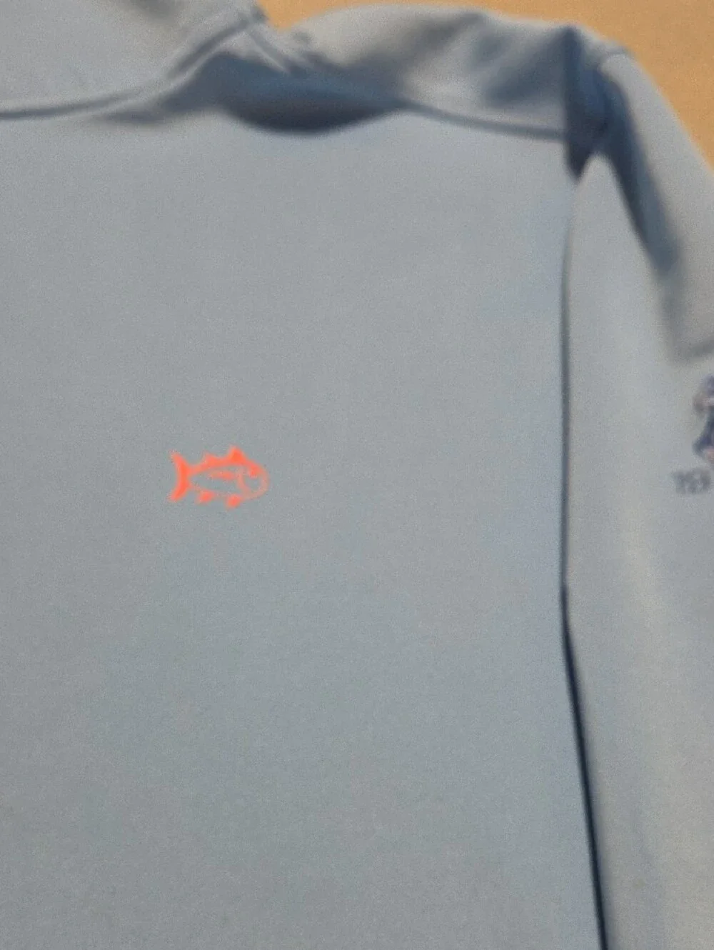 Southern Tide Men's Light Blue Quarter-Zip Sweater with Coral Accent